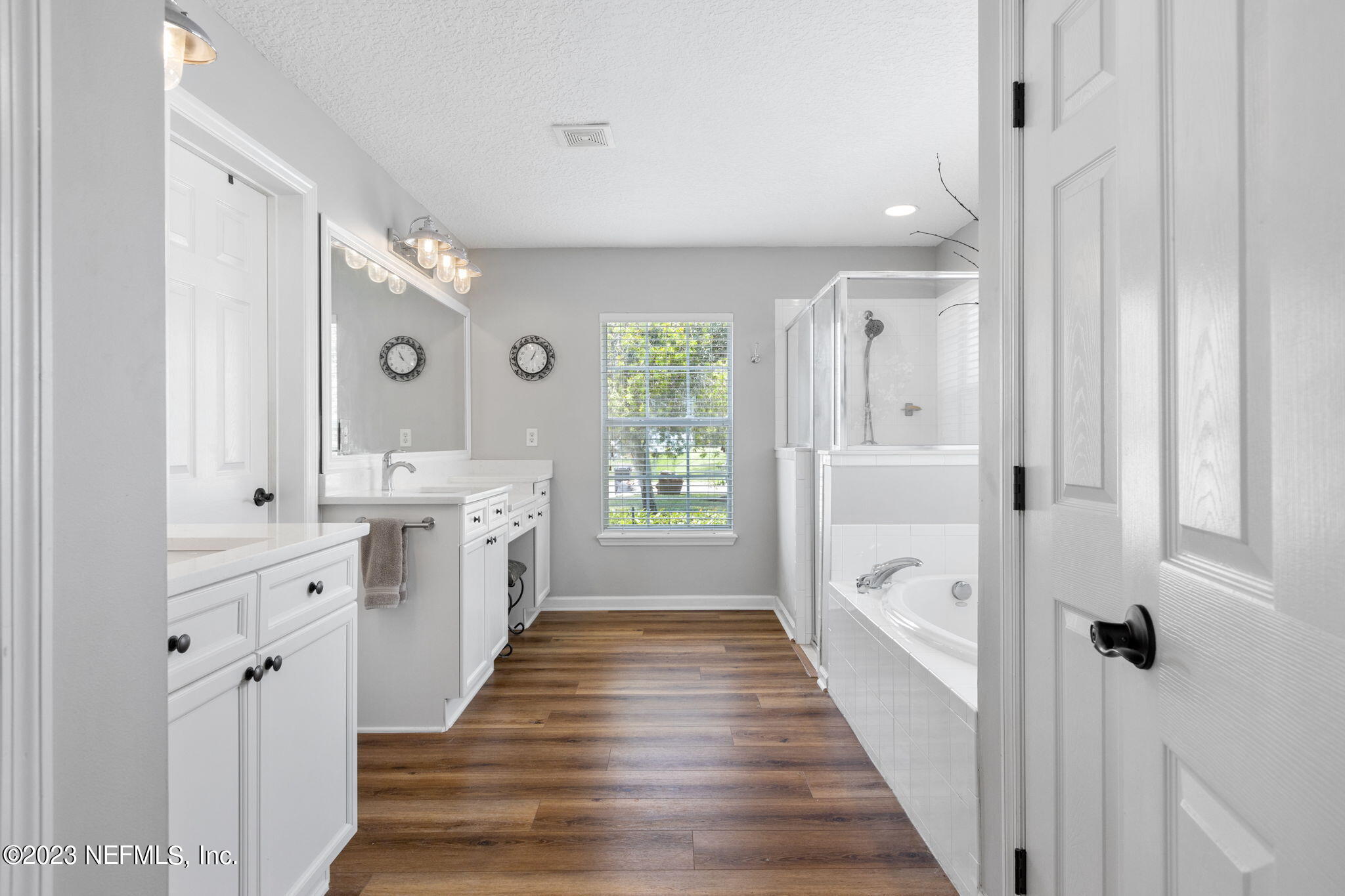 293 Porta Rosa Circle St. Augustine, FL 32092 - Photo 15 of 37 a large white kitchen with a large window and double vanity