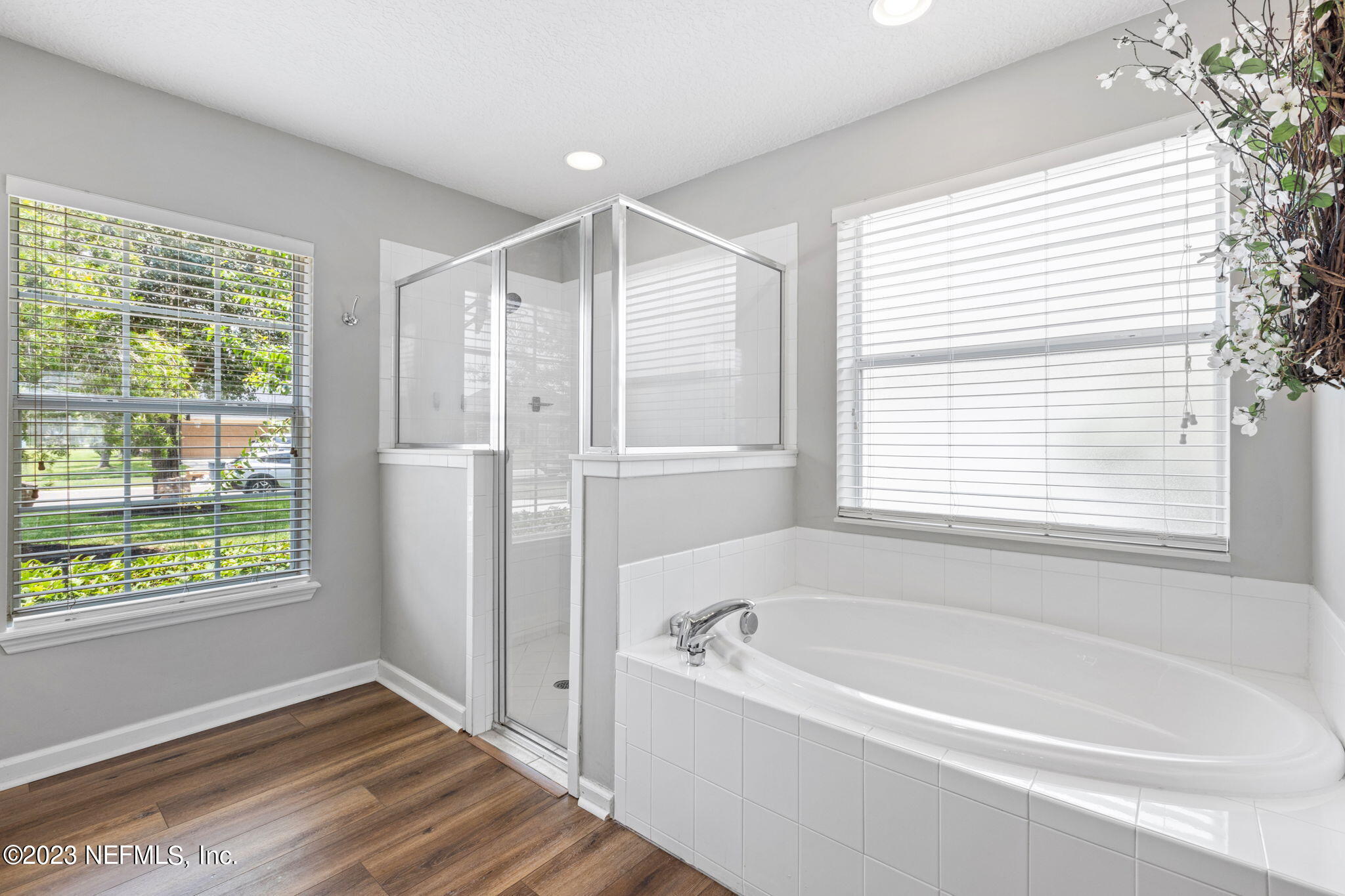 293 Porta Rosa Circle St. Augustine, FL 32092 - Photo 16 of 37 a white bath tub sitting next to a window