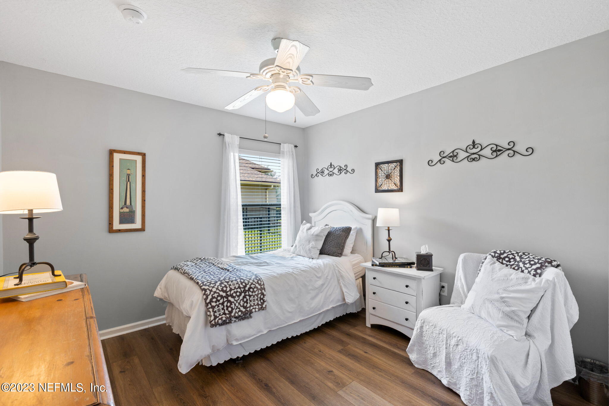 293 Porta Rosa Circle St. Augustine, FL 32092 - Photo 17 of 37 a bedroom with a bed and a couch