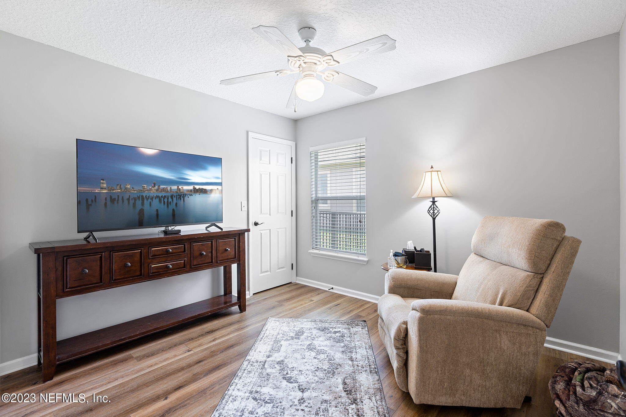 293 Porta Rosa Circle St. Augustine, FL 32092 - Photo 20 of 37 a living room with furniture and a flat screen tv