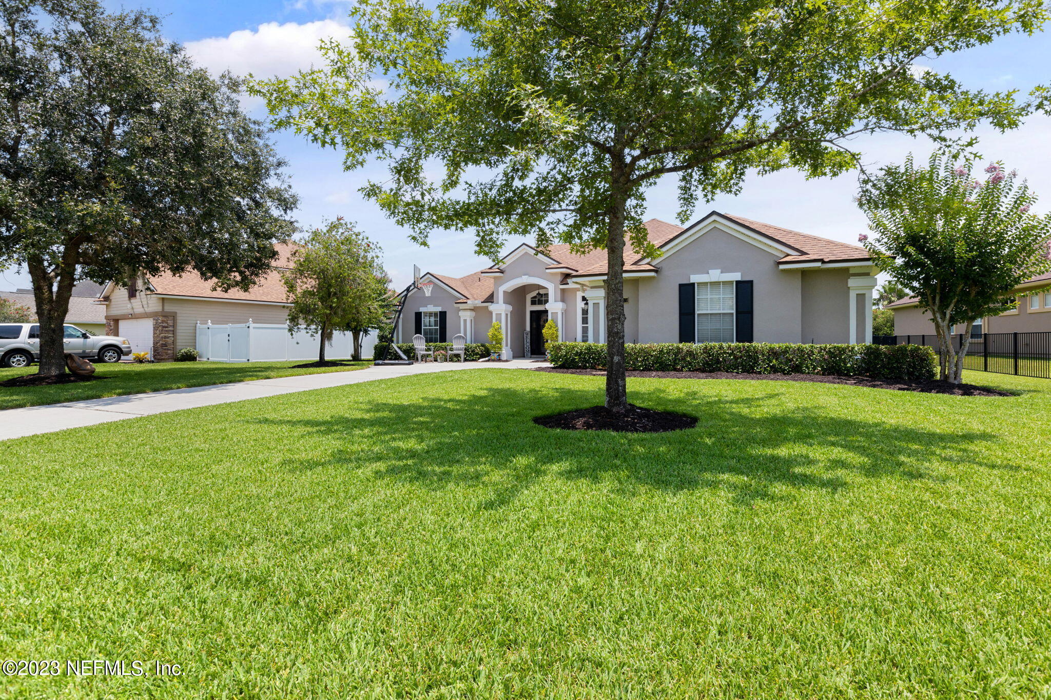 293 Porta Rosa Circle St. Augustine, FL 32092 - Photo 2 of 37 a front view of house with yard and green space