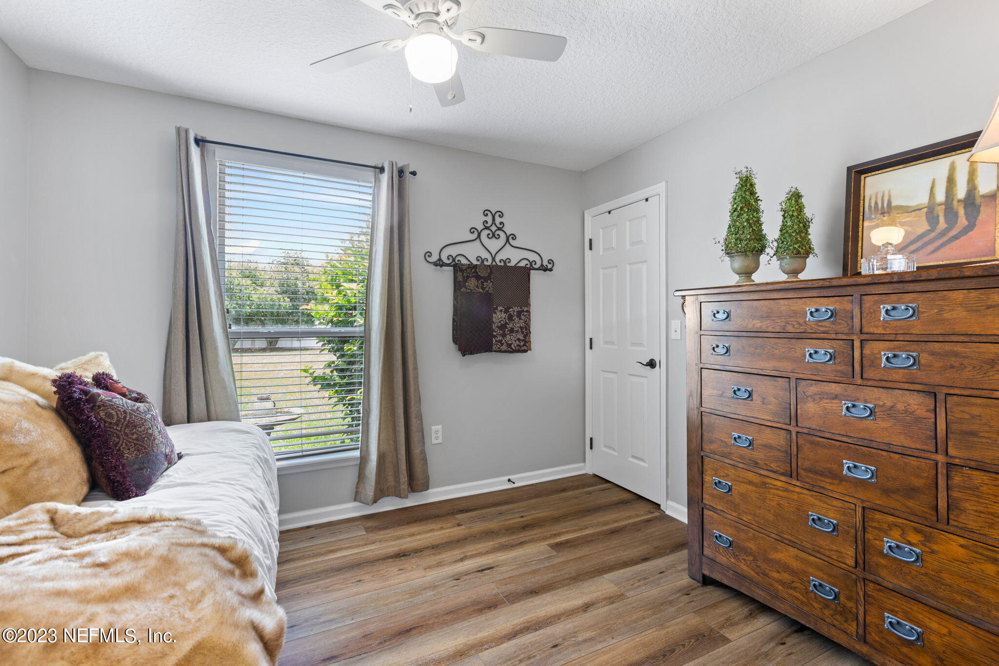 293 Porta Rosa Circle St. Augustine, FL 32092 - Photo 21 of 37 a bedroom with a bed and a dresser