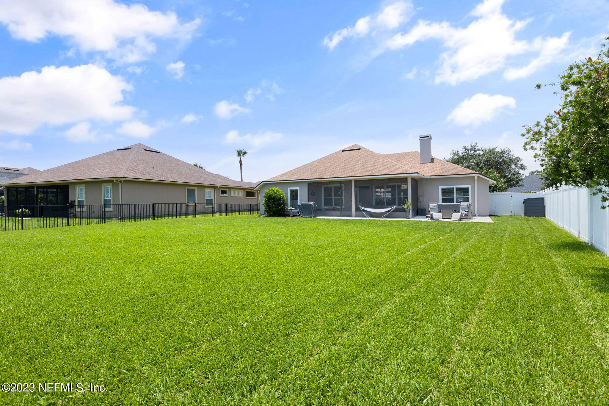 293 Porta Rosa Circle St. Augustine, FL 32092 - Photo 25 of 37 a front view of house with yard and green space