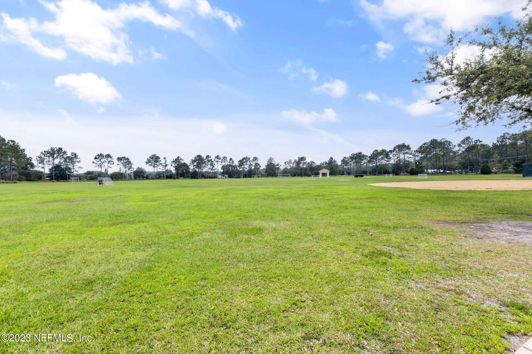 293 Porta Rosa Circle St. Augustine, FL 32092 - Photo 30 of 37 a view of a big room with an ocean and trees in the background