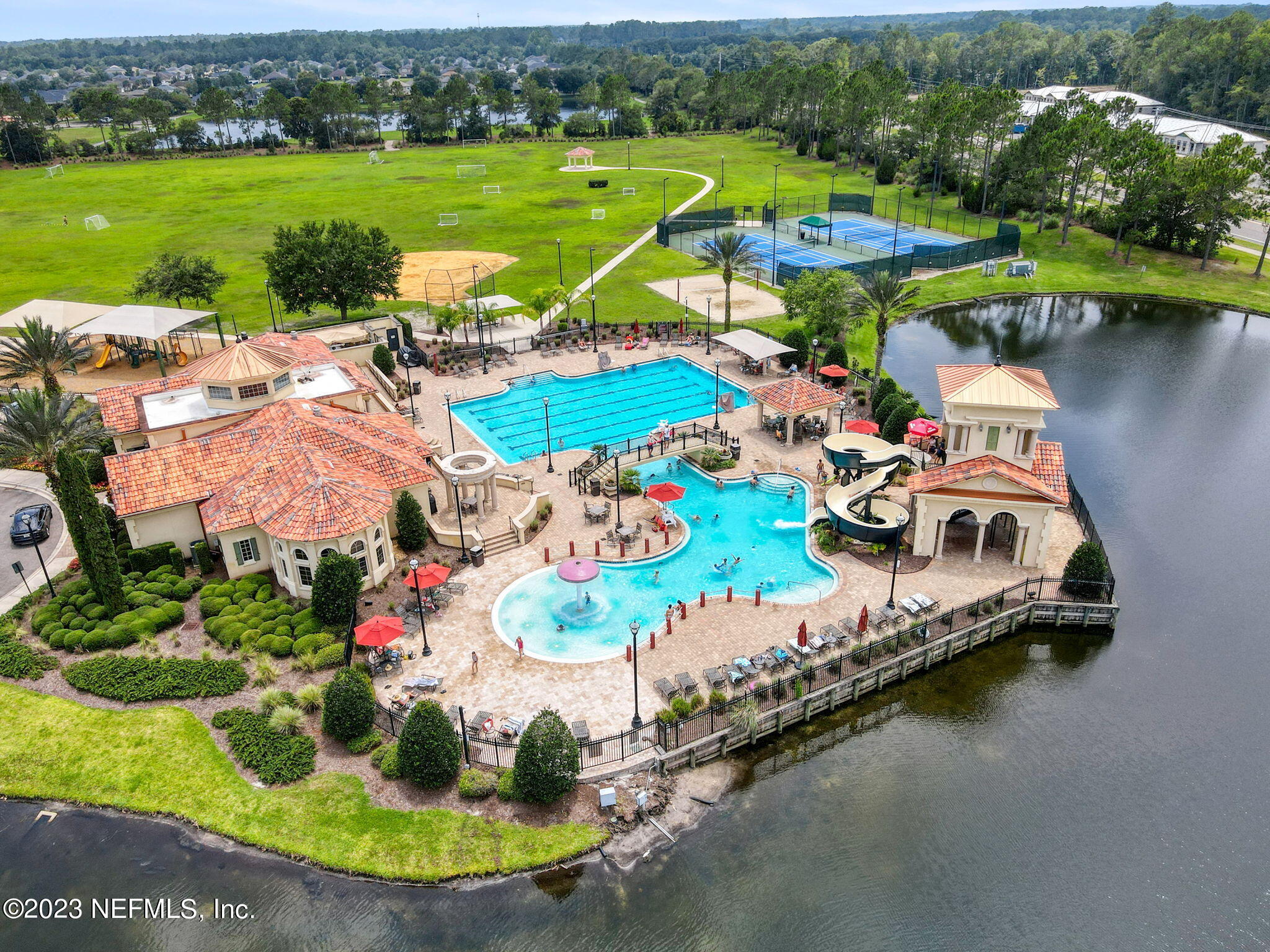293 Porta Rosa Circle St. Augustine, FL 32092 - Photo 34 of 37 an aerial view of residential houses with outdoor space and lake view