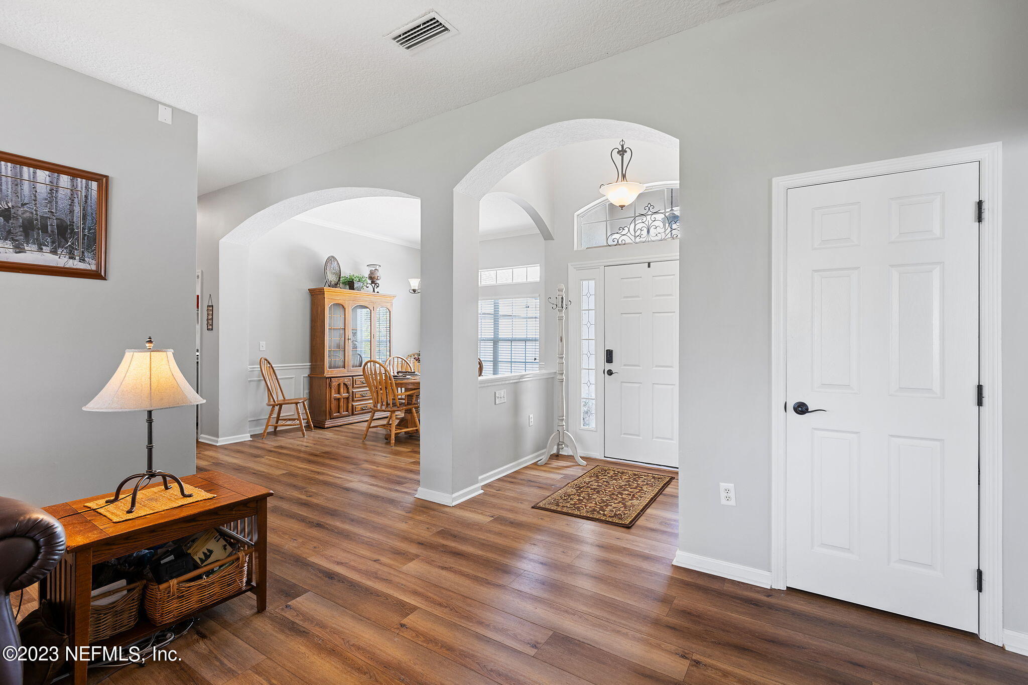 293 Porta Rosa Circle St. Augustine, FL 32092 - Photo 5 of 37 a view of a livingroom with furniture and wooden floor