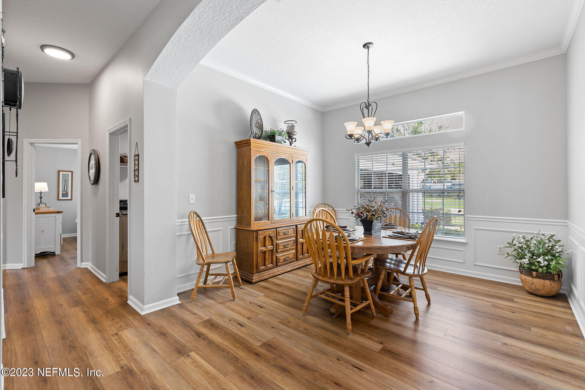 293 Porta Rosa Circle St. Augustine, FL 32092 - Photo 6 of 37 a view of a dining room with furniture window and wooden floor
