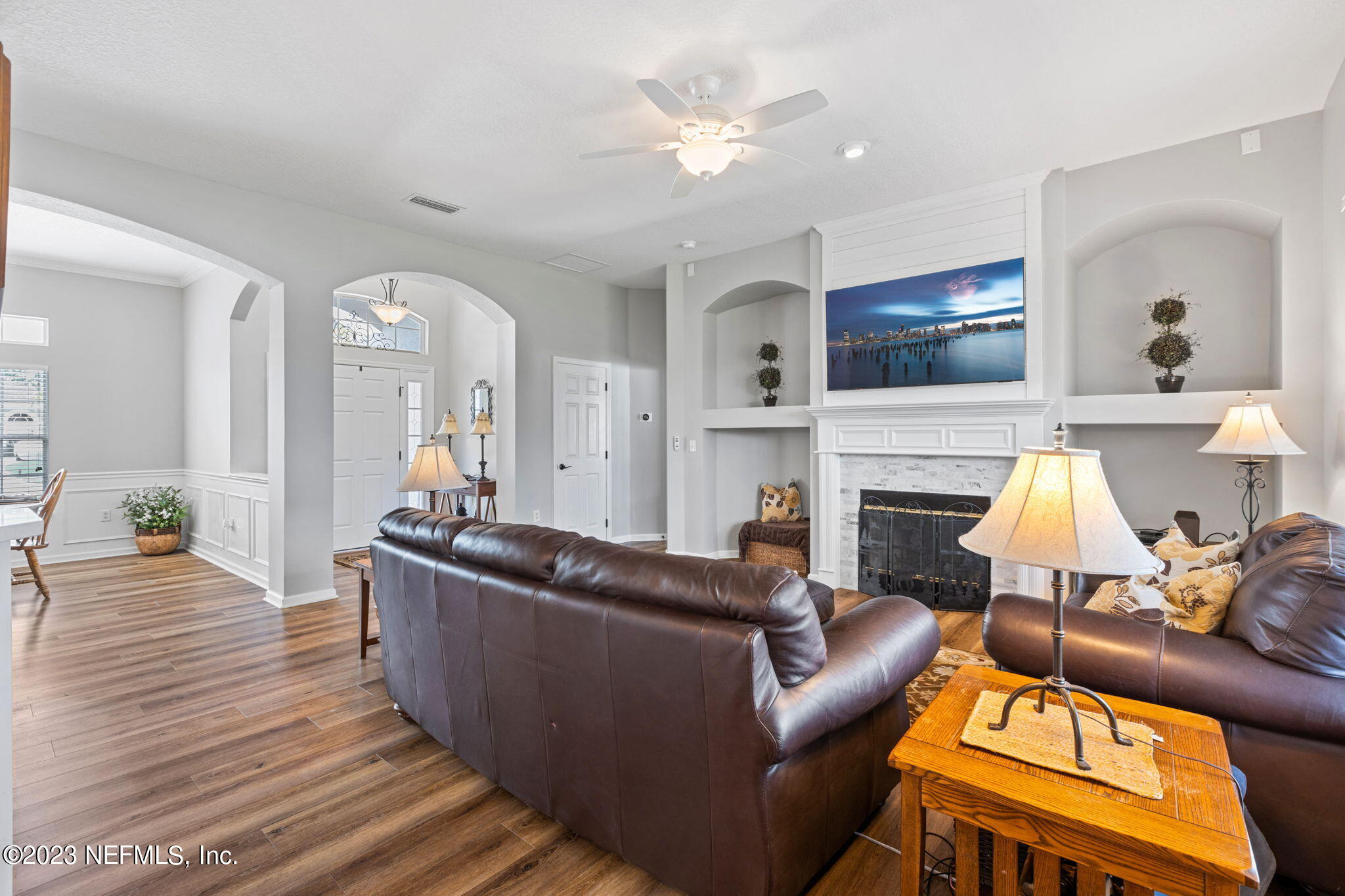 293 Porta Rosa Circle St. Augustine, FL 32092 - Photo 8 of 37 a living room with furniture and a fireplace
