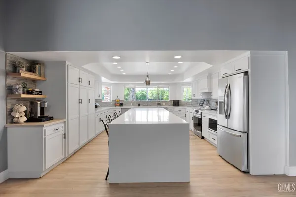 a kitchen with a sink and a window