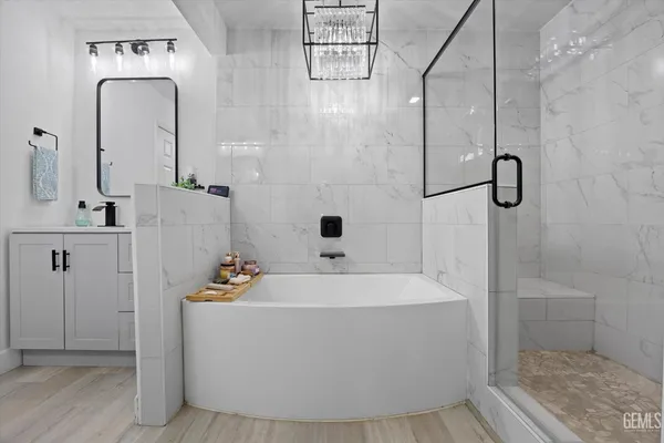 a large kitchen with cabinets a sink and a stove