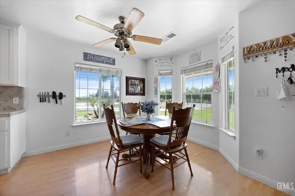 a view of a swimming pool with a lounge chair