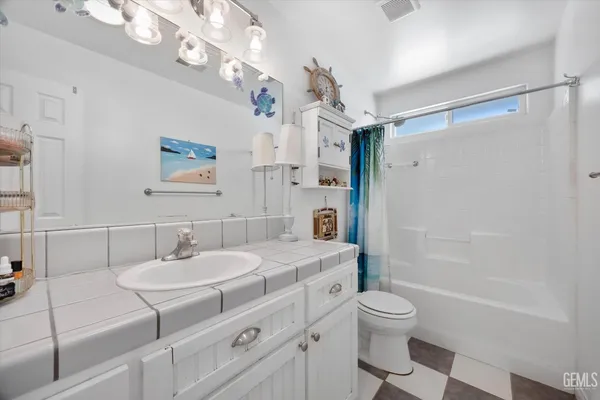 a view of backyard with swimming pool and outdoor seating