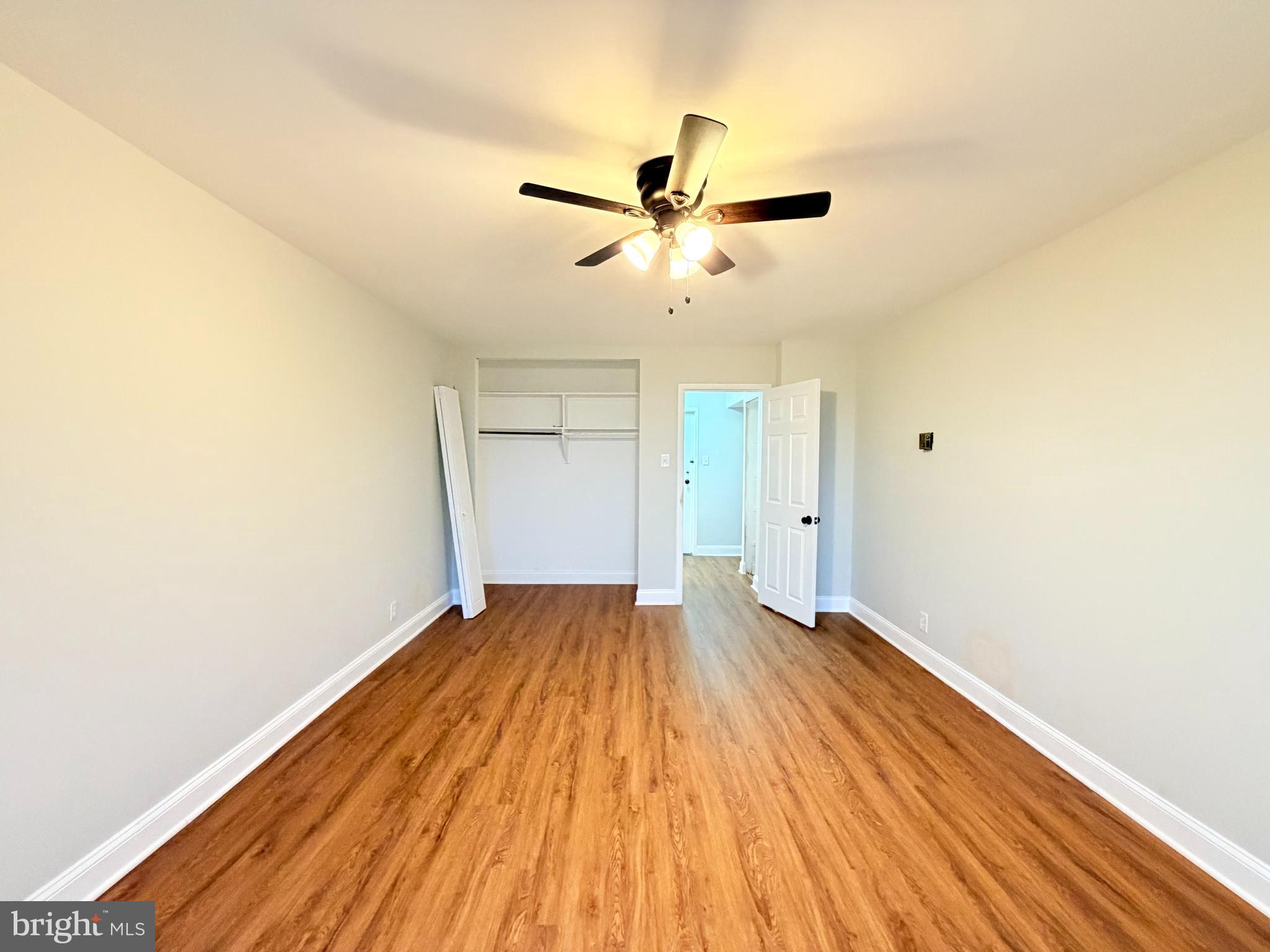 301 North Beauregard Street, Unit 703 Alexandria, VA 22312 - Photo 12 of 16 a view of empty room with wooden floor
