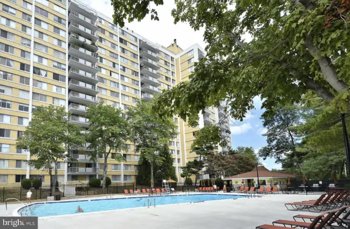 301 North Beauregard Street, Unit 703 Alexandria, VA 22312 - Photo 15 of 16 front view of a building with a street