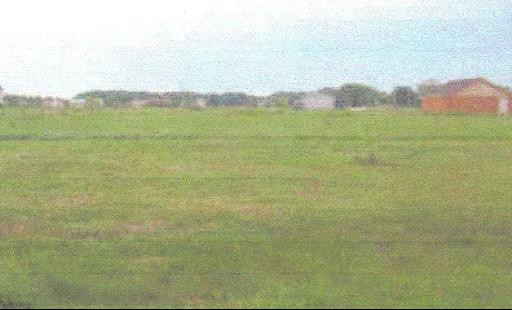 2804 2559th Road Marseilles, IL 61341 - Photo 1 of 1 a view of a field with mountains in the background