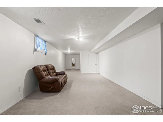 a view of a room with an empty space