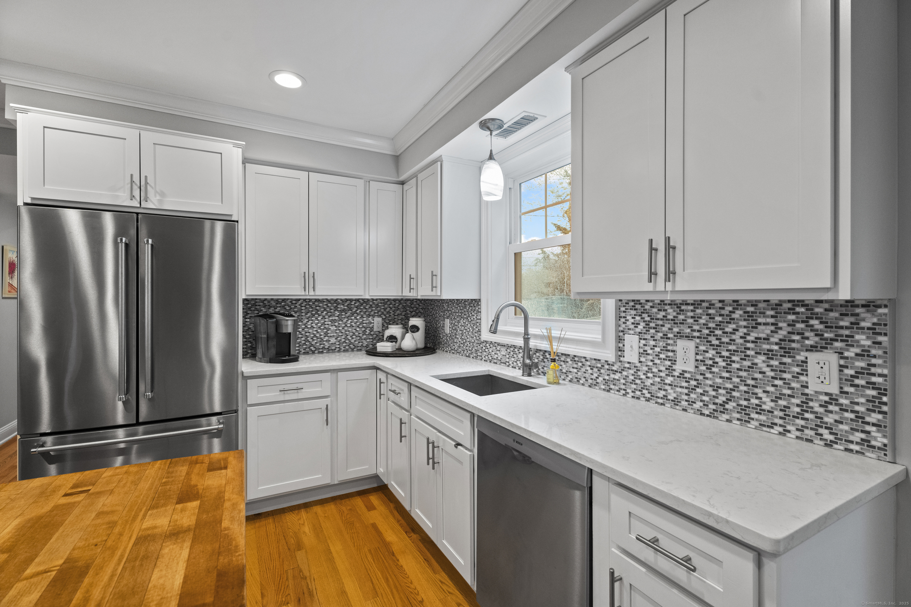 3 Arrowhead Road Madison, CT 06443 - Photo 16 of 40 a kitchen with a sink stove and refrigerator