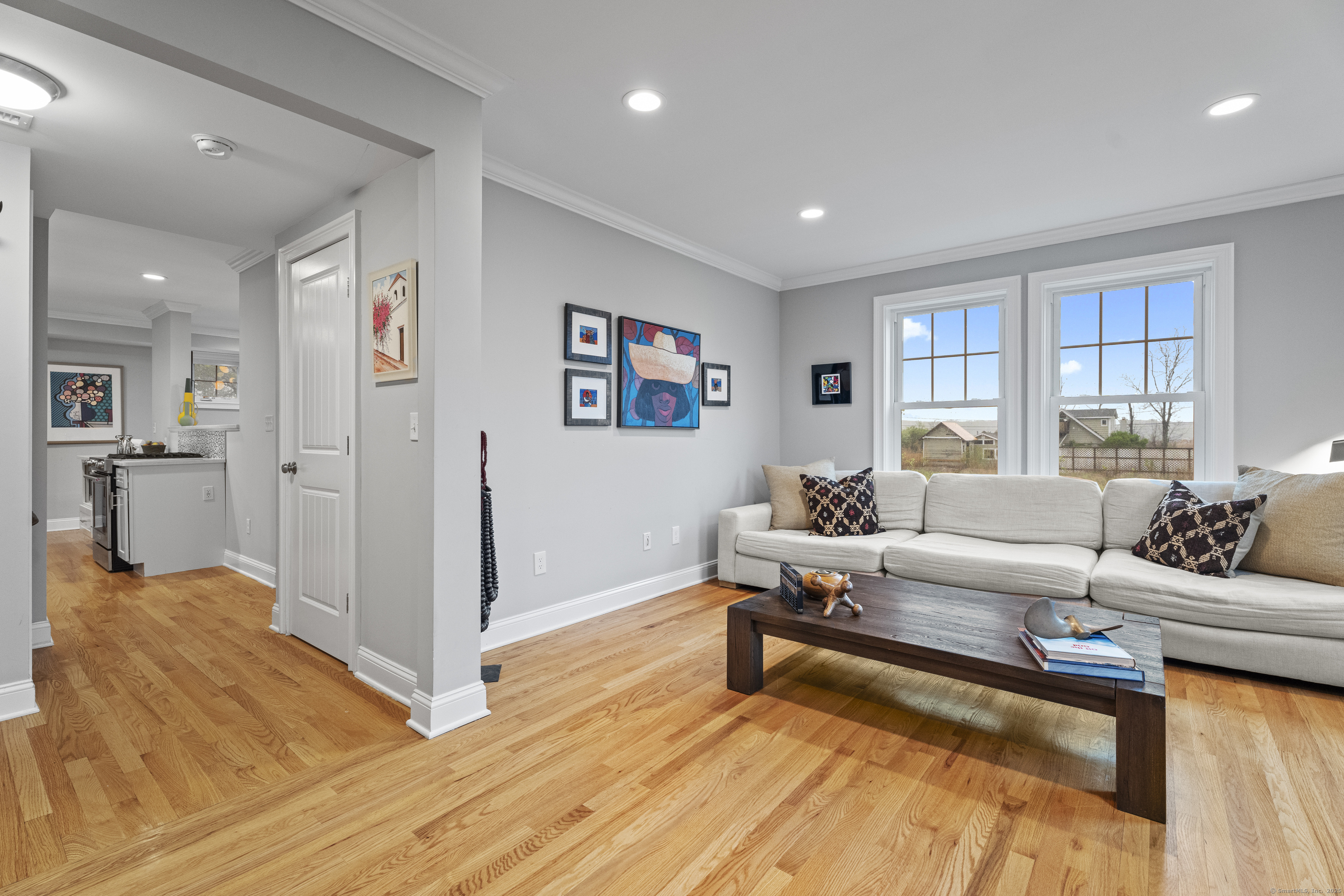 3 Arrowhead Road Madison, CT 06443 - Photo 17 of 40 a living room with furniture and a rug