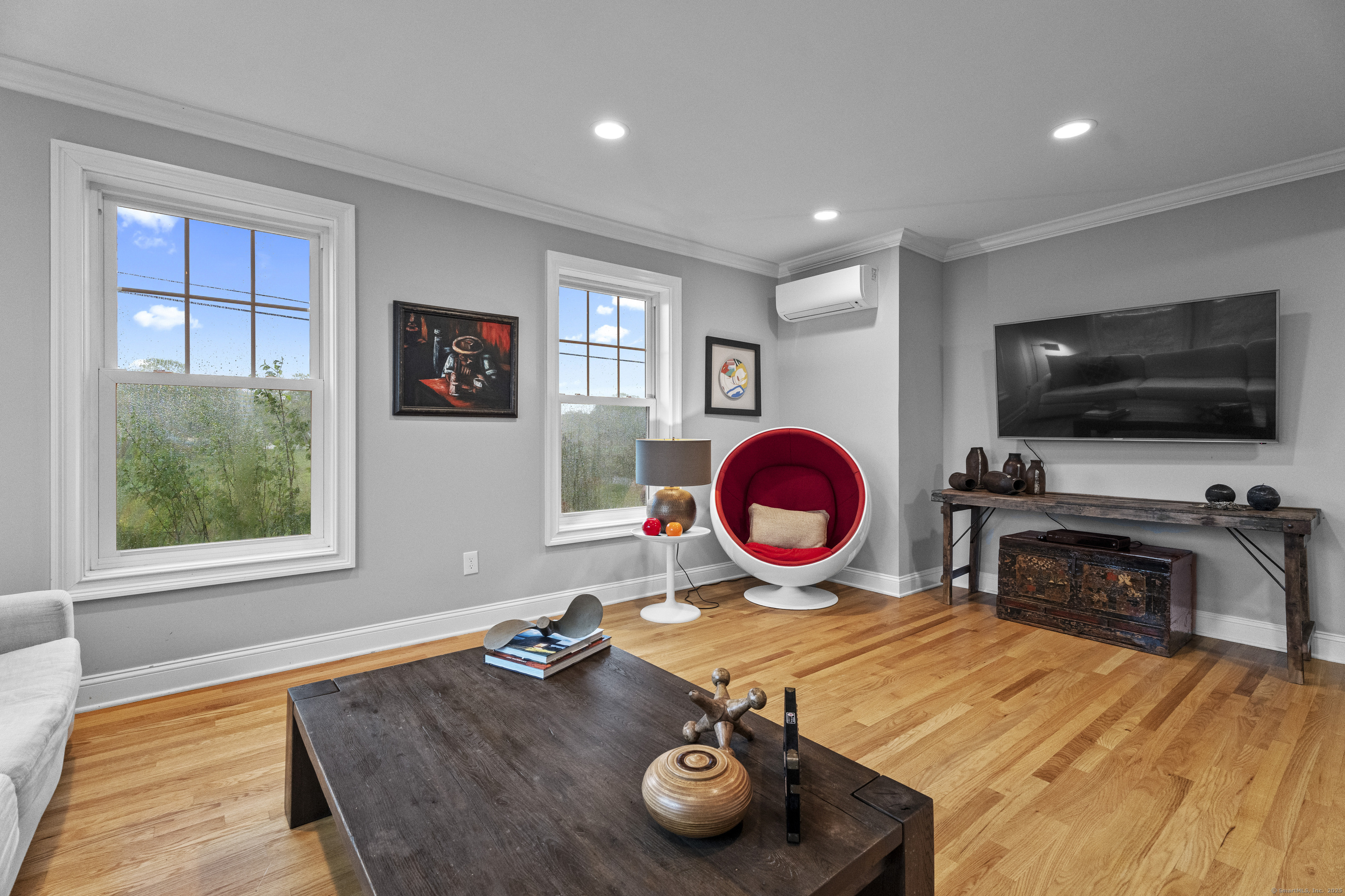 3 Arrowhead Road Madison, CT 06443 - Photo 18 of 40 a room with furniture and flat screen tv