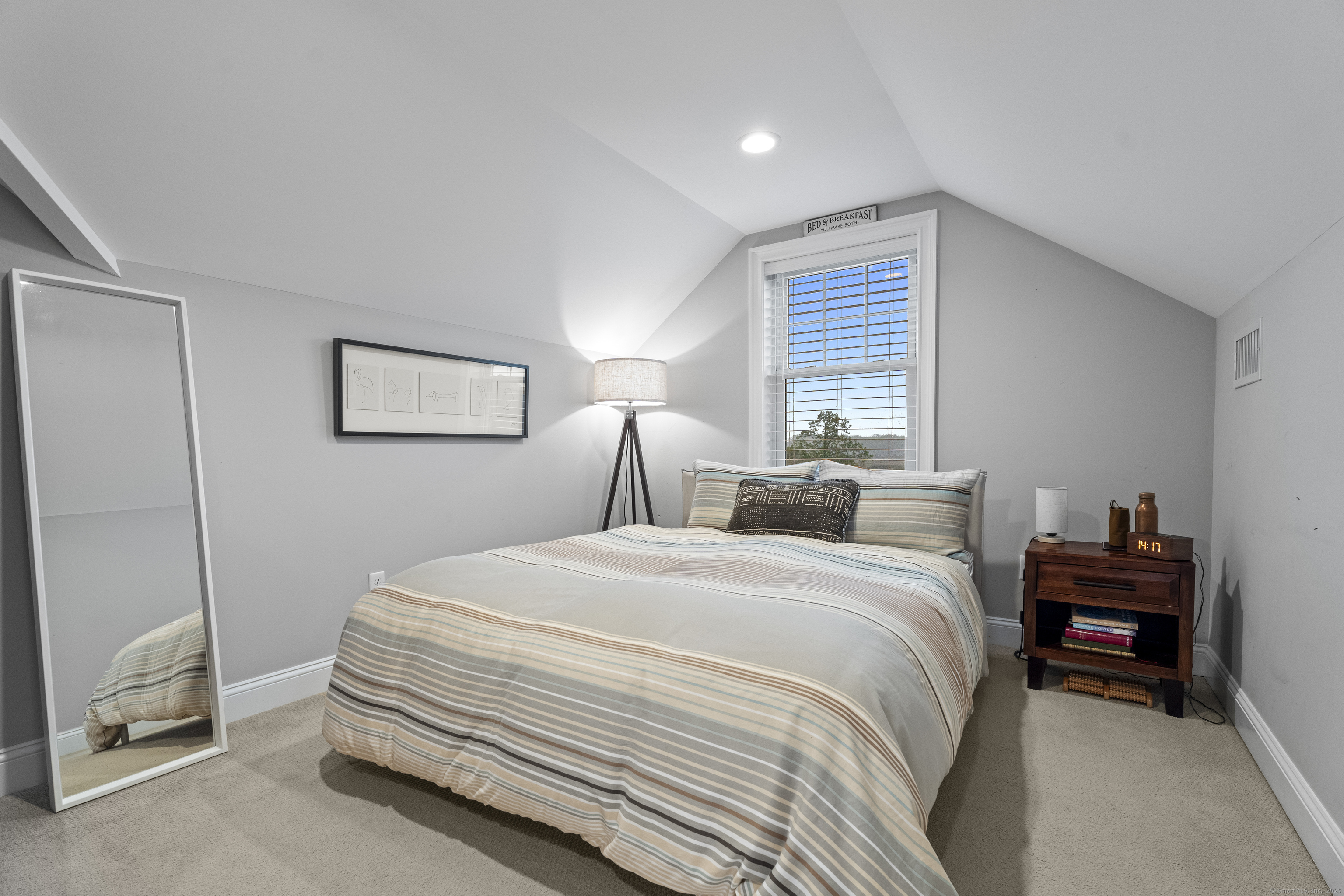 3 Arrowhead Road Madison, CT 06443 - Photo 21 of 40 a bedroom with a bed and a window