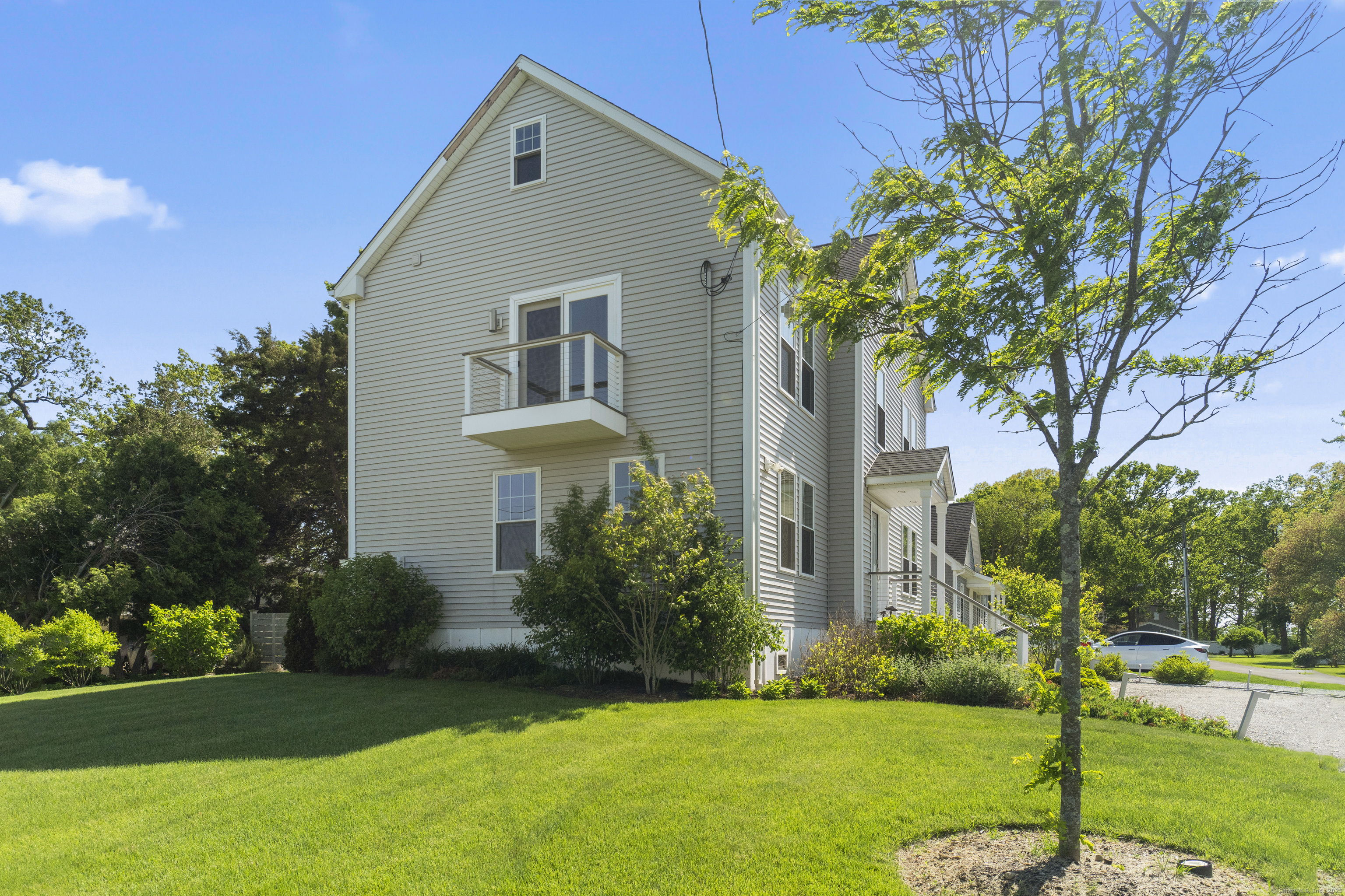3 Arrowhead Road Madison, CT 06443 - Photo 36 of 40 a front view of house with yard and green space