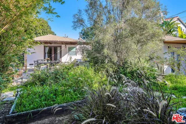 a view of a car park in front of house