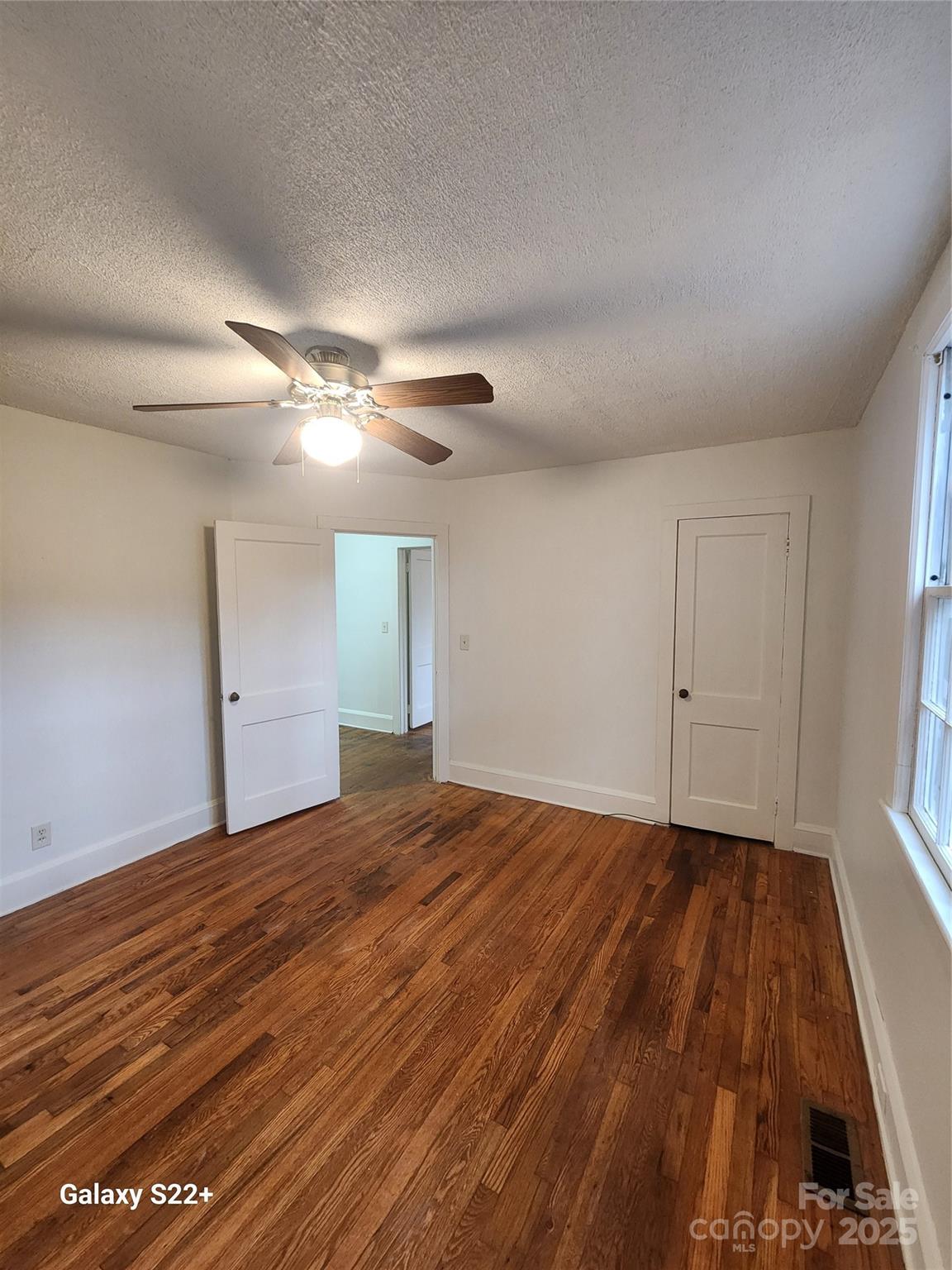 305 Louise Avenue Rockingham, NC 28379 - Photo 15 of 20 a view of an empty room and window