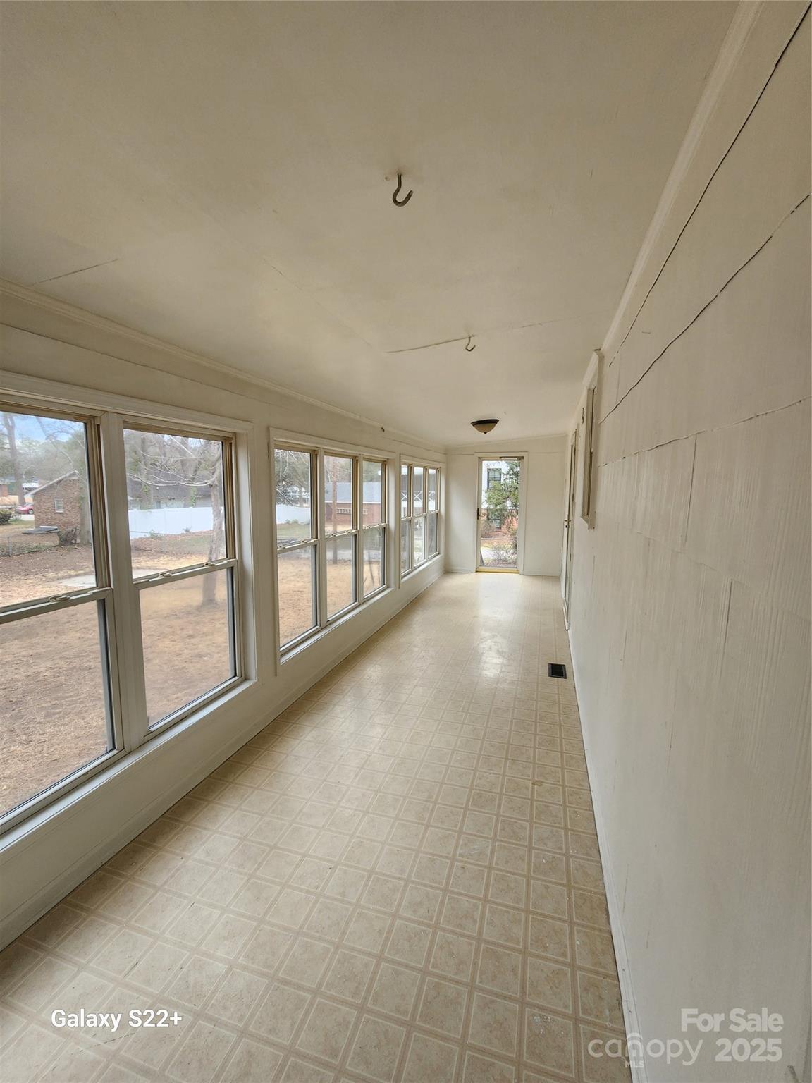305 Louise Avenue Rockingham, NC 28379 - Photo 17 of 20 a view of an empty room with a window