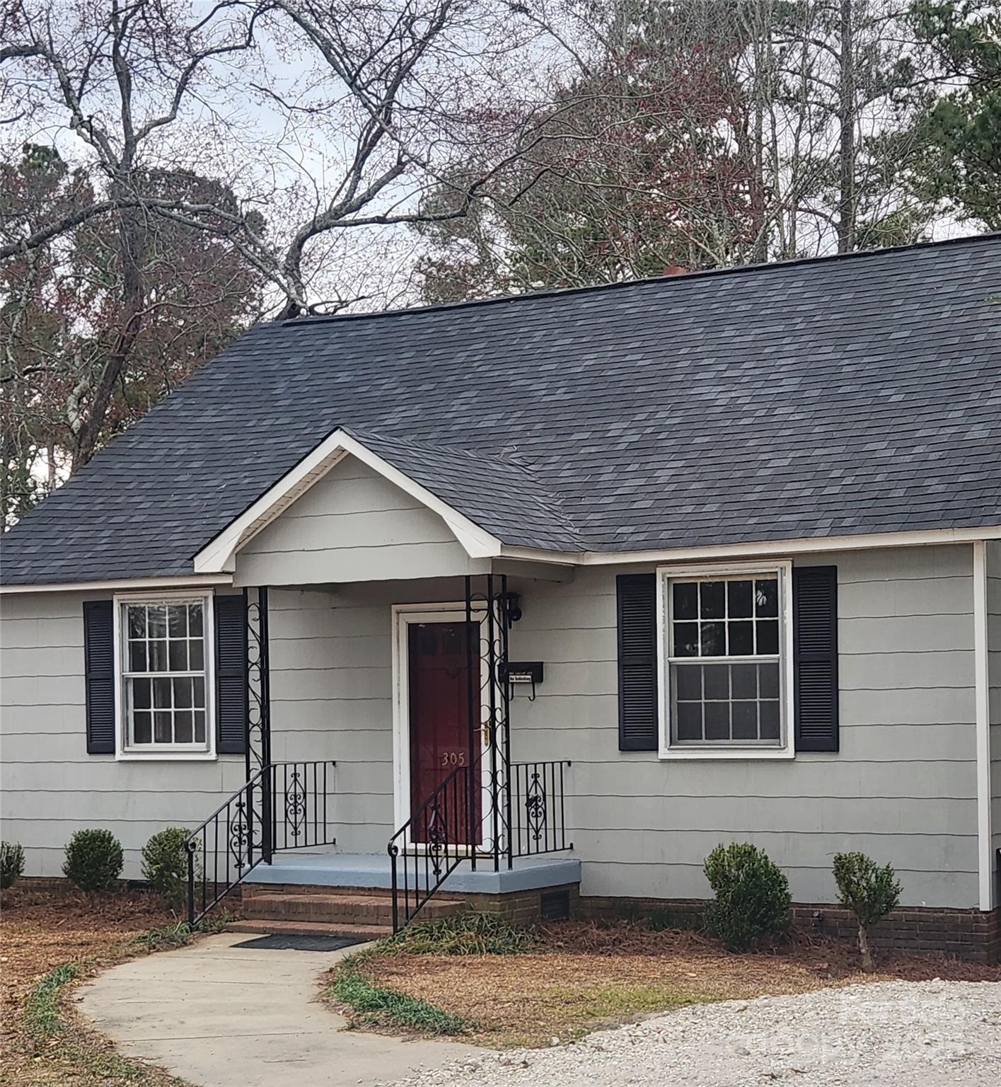 305 Louise Avenue Rockingham, NC 28379 - Photo 20 of 20 a house view with a outdoor space