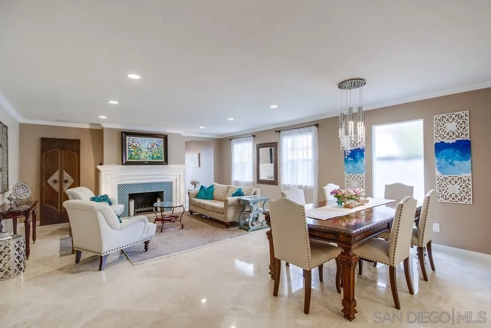 754 A Avenue Coronado, CA 92118 - Photo 11 of 25 a living room with furniture a fireplace and a table