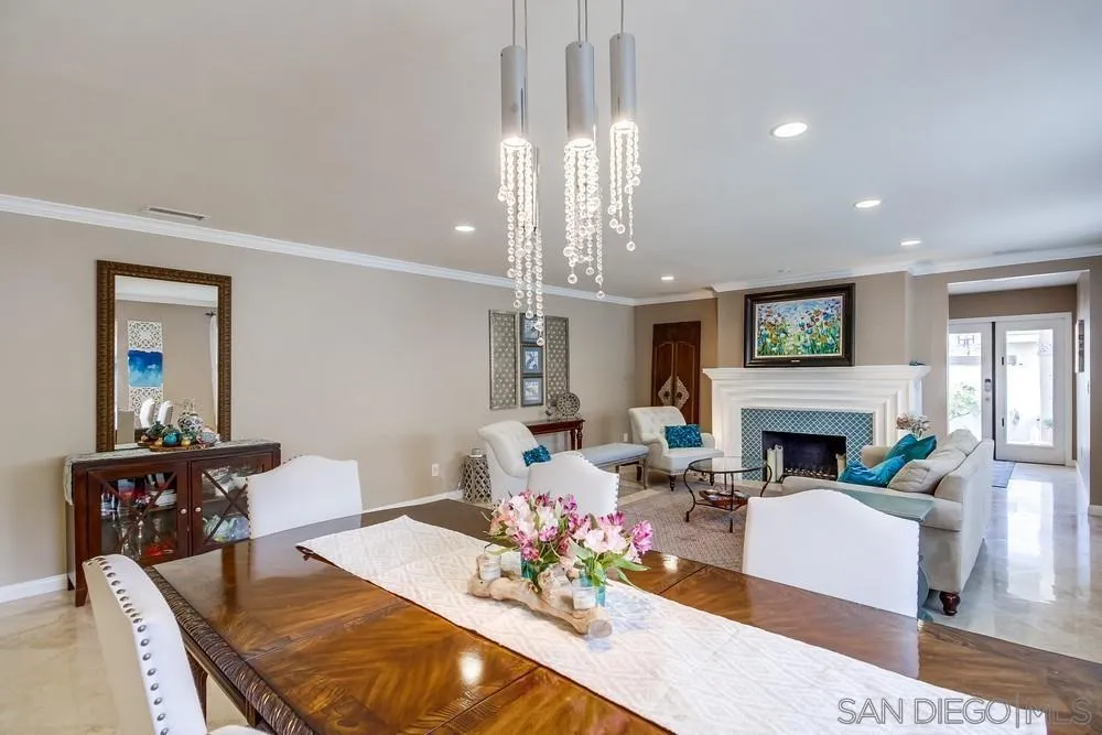 754 A Avenue Coronado, CA 92118 - Photo 12 of 25 a living room with fireplace furniture and a chandelier