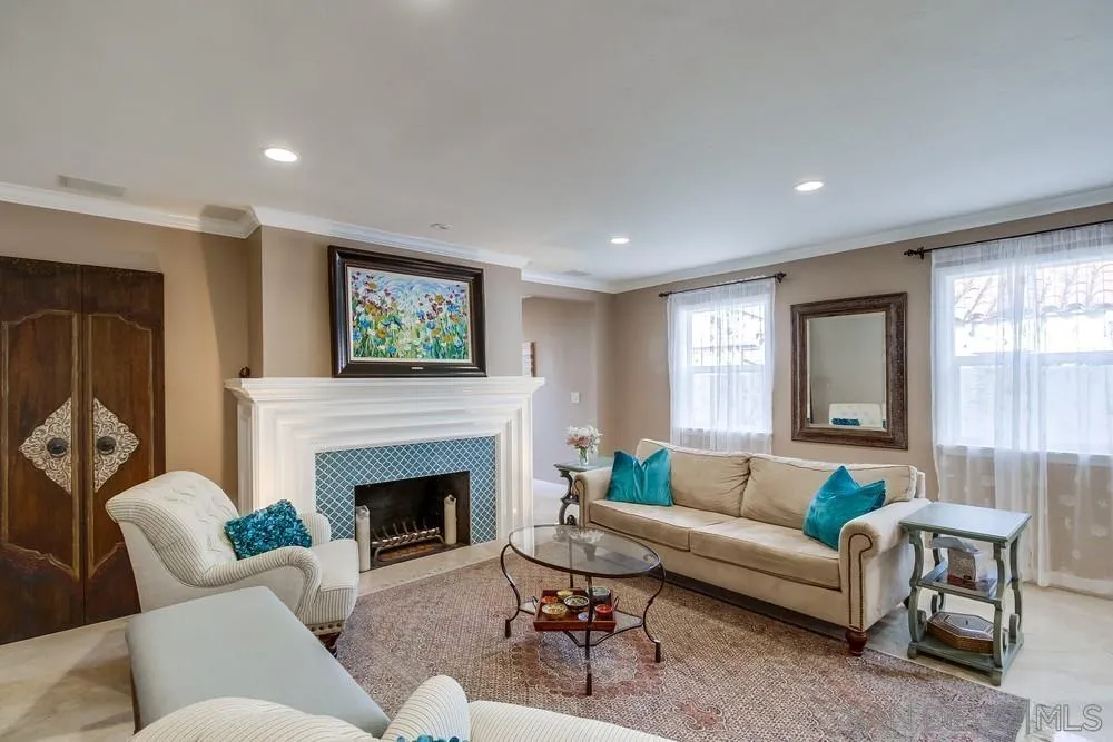 754 A Avenue Coronado, CA 92118 - Photo 13 of 25 a living room with furniture and a fireplace