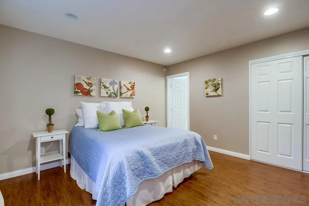 754 A Avenue Coronado, CA 92118 - Photo 16 of 25 a bedroom with a bed and a table