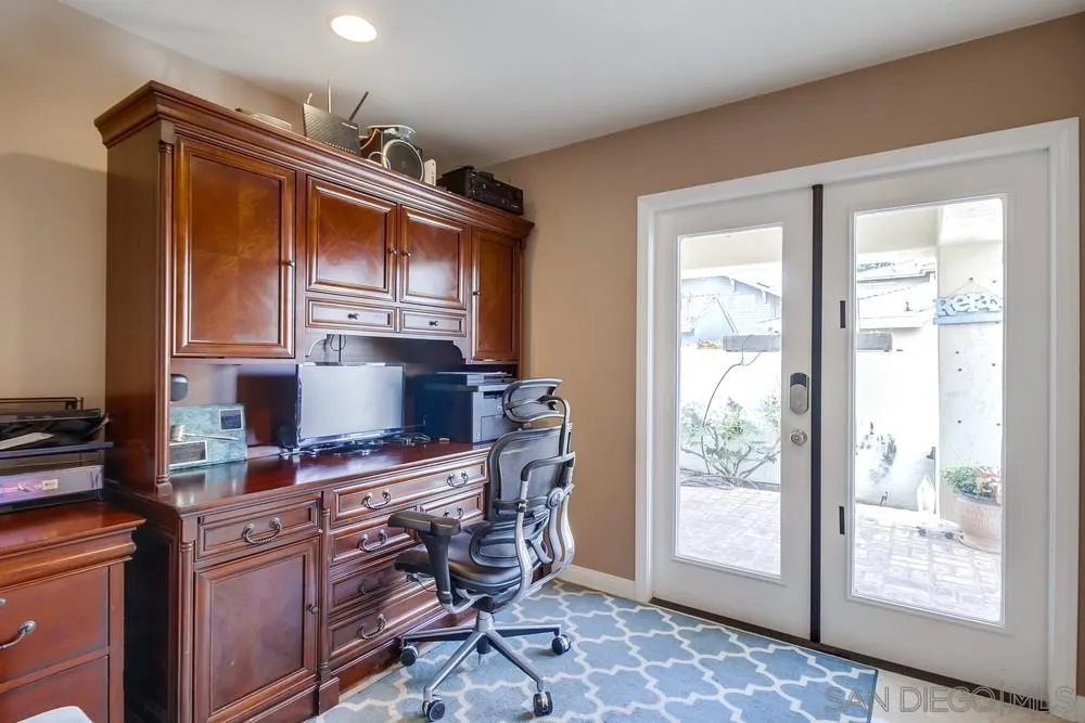 754 A Avenue Coronado, CA 92118 - Photo 25 of 25 a kitchen with stainless steel appliances granite countertop a stove a sink and a refrigerator