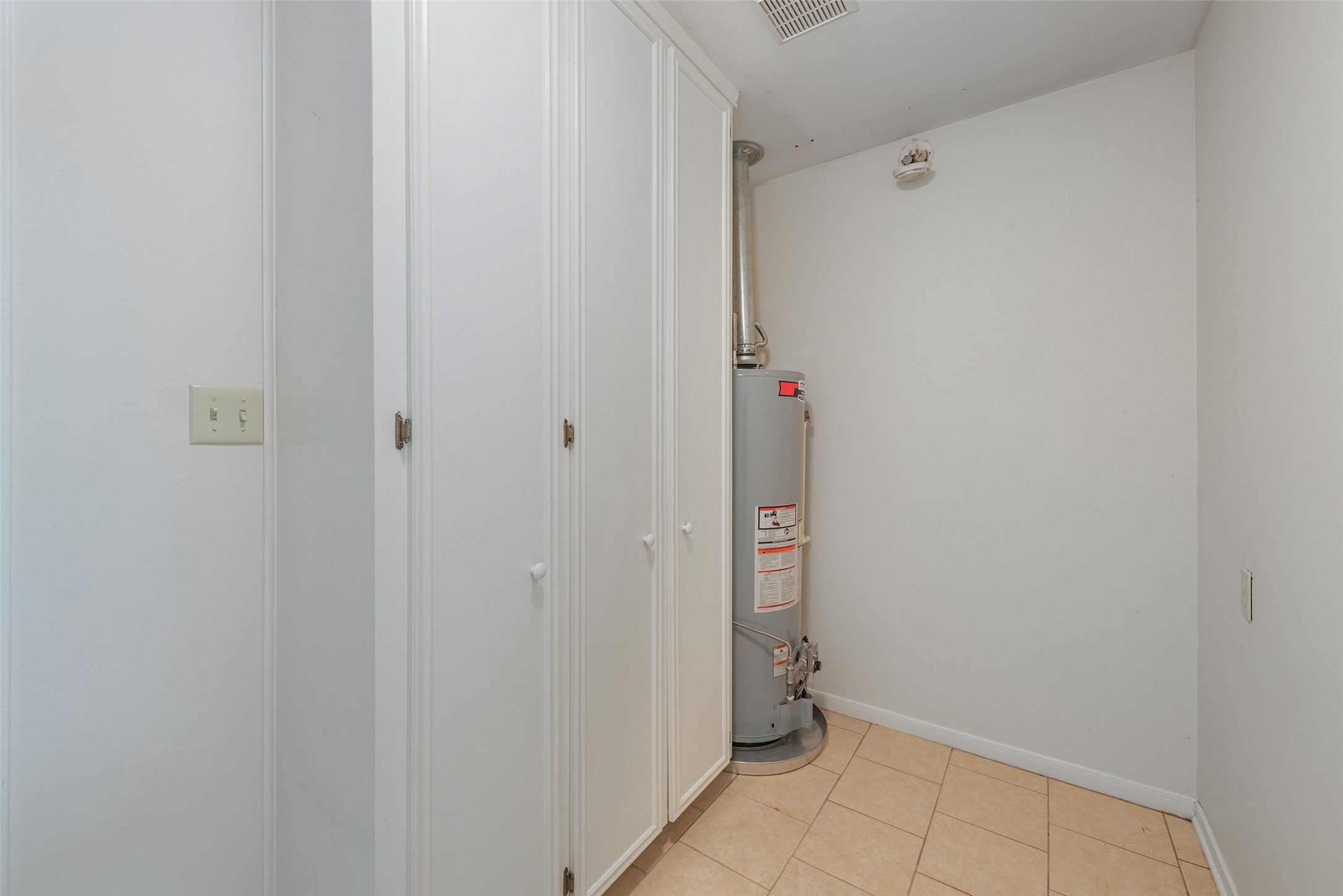 2017 Penick Road Waller, TX 77484 - Photo 19 of 28 Extra Storage Cabinets in Utility room