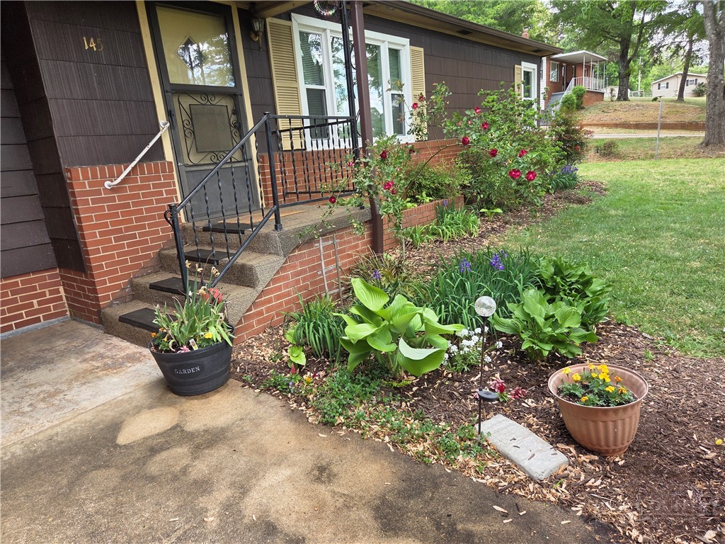 145 Black Oak Ridge Road Taylorsville, NC 28681 - Photo 38 of 39 a view of a backyard with sitting area