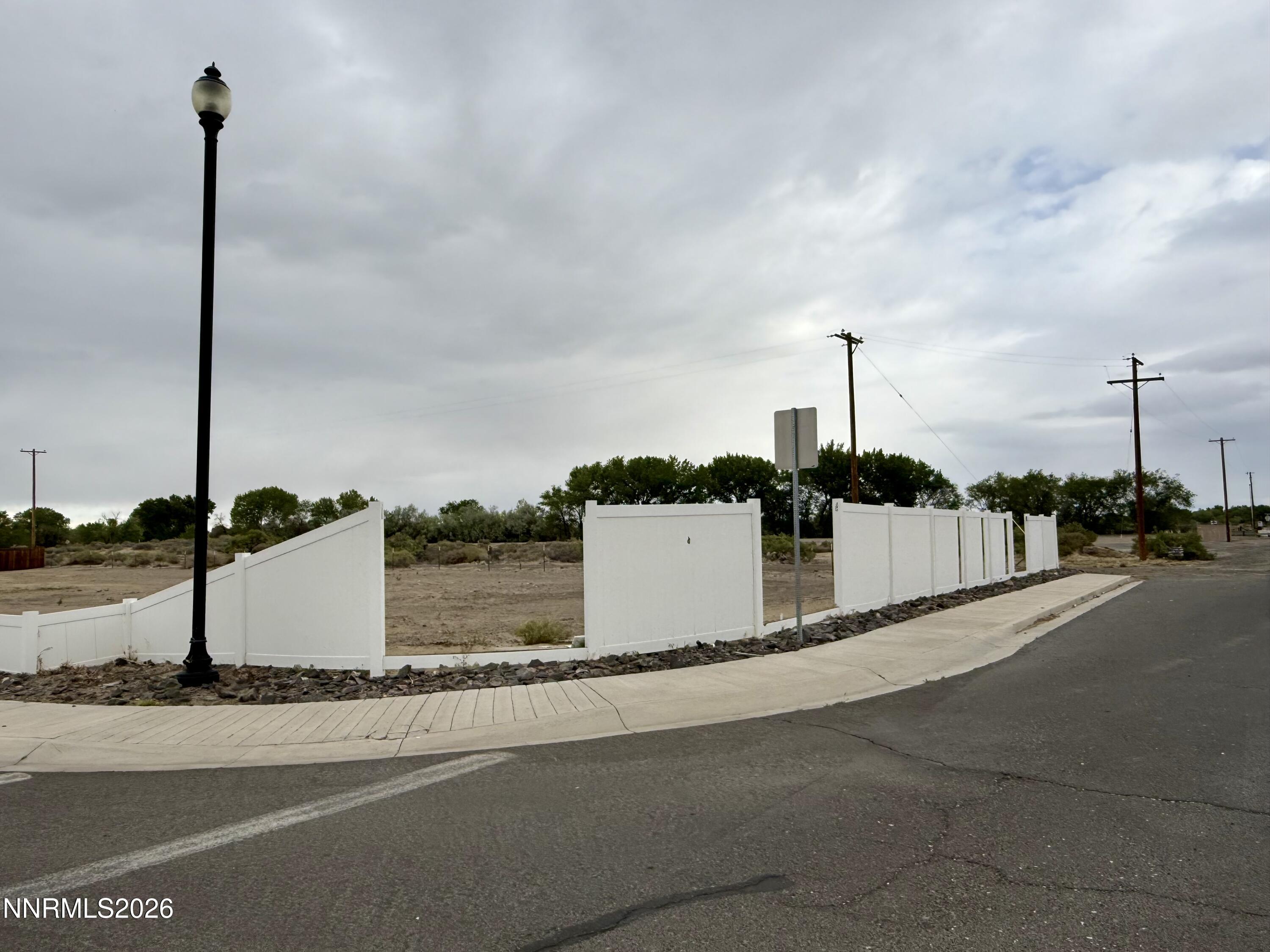 804 Maple Way Fallon, NV 89406 - Photo 1 of 2 a street sign on the side of a road