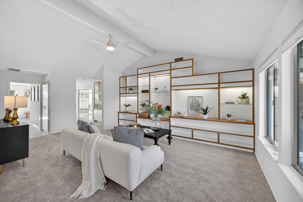 5033 El Cemonte Avenue Davis, CA 95618 - Photo 28 of 76 a living room with furniture and a large window