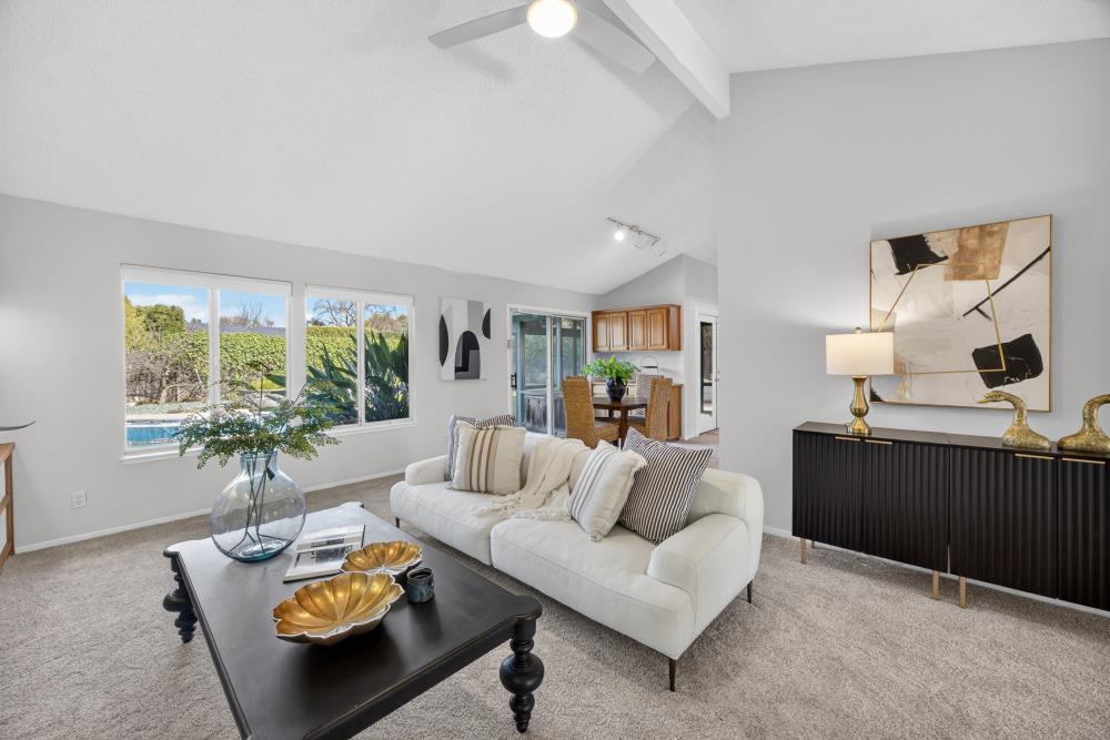 5033 El Cemonte Avenue Davis, CA 95618 - Photo 30 of 76 a living room with furniture and a large window