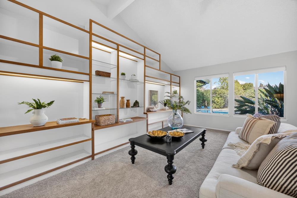 5033 El Cemonte Avenue Davis, CA 95618 - Photo 32 of 76 a living room with furniture and a large window