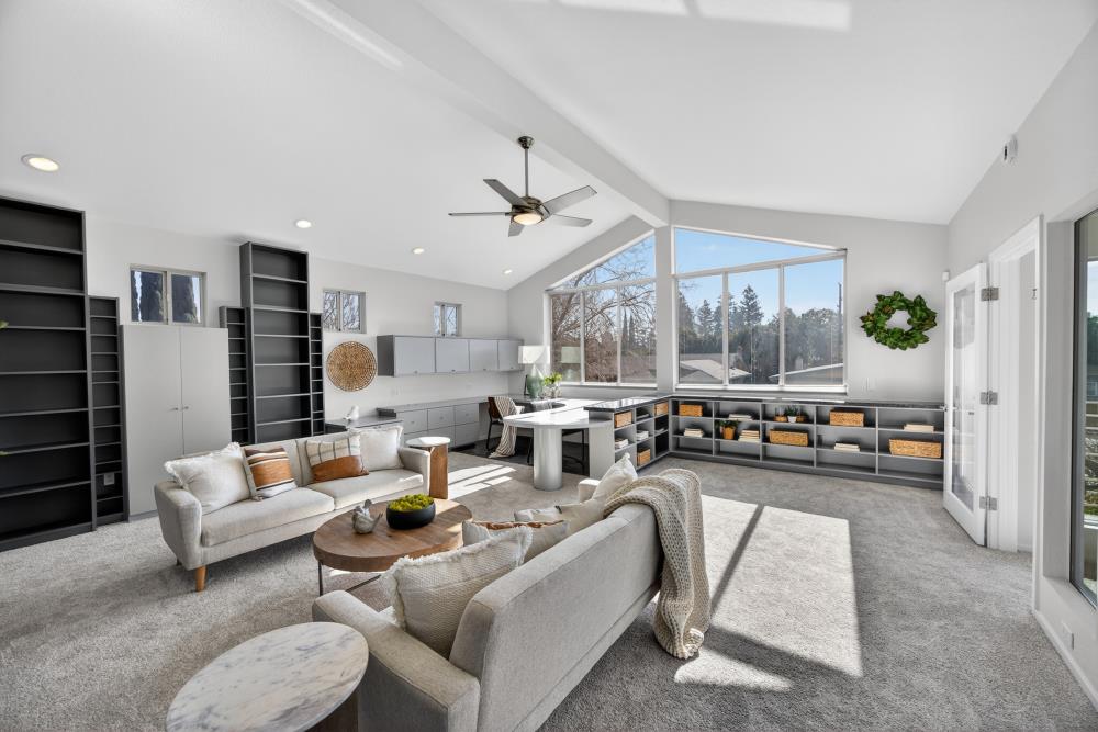 5033 El Cemonte Avenue Davis, CA 95618 - Photo 52 of 76 a living room with furniture and a large window