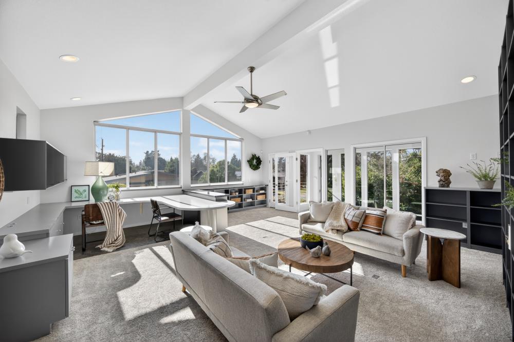 5033 El Cemonte Avenue Davis, CA 95618 - Photo 53 of 76 a living room with furniture and a large window