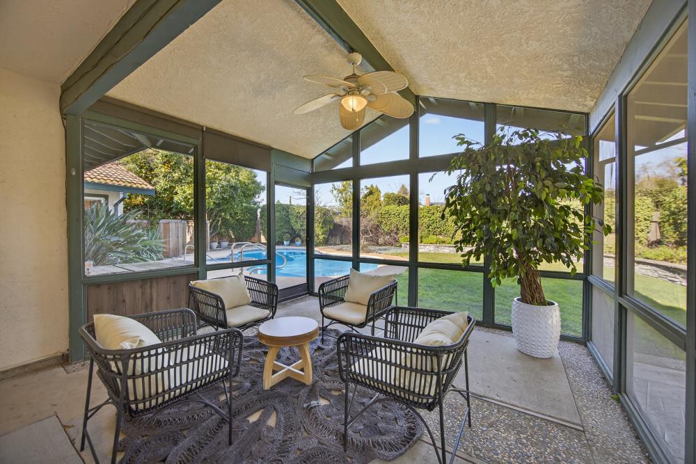 5033 El Cemonte Avenue Davis, CA 95618 - Photo 70 of 76 a view of porch with furniture and garden