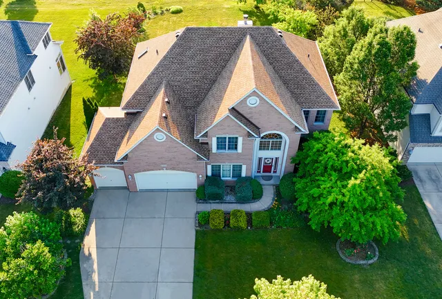 a aerial view of a house with garden