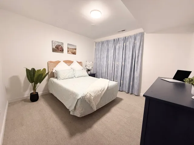 a view of a entryway with wooden floor
