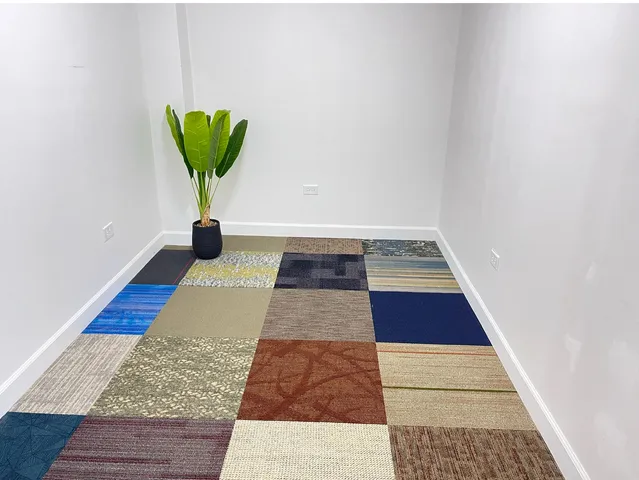 a view of sitting area with swimming pool and green space