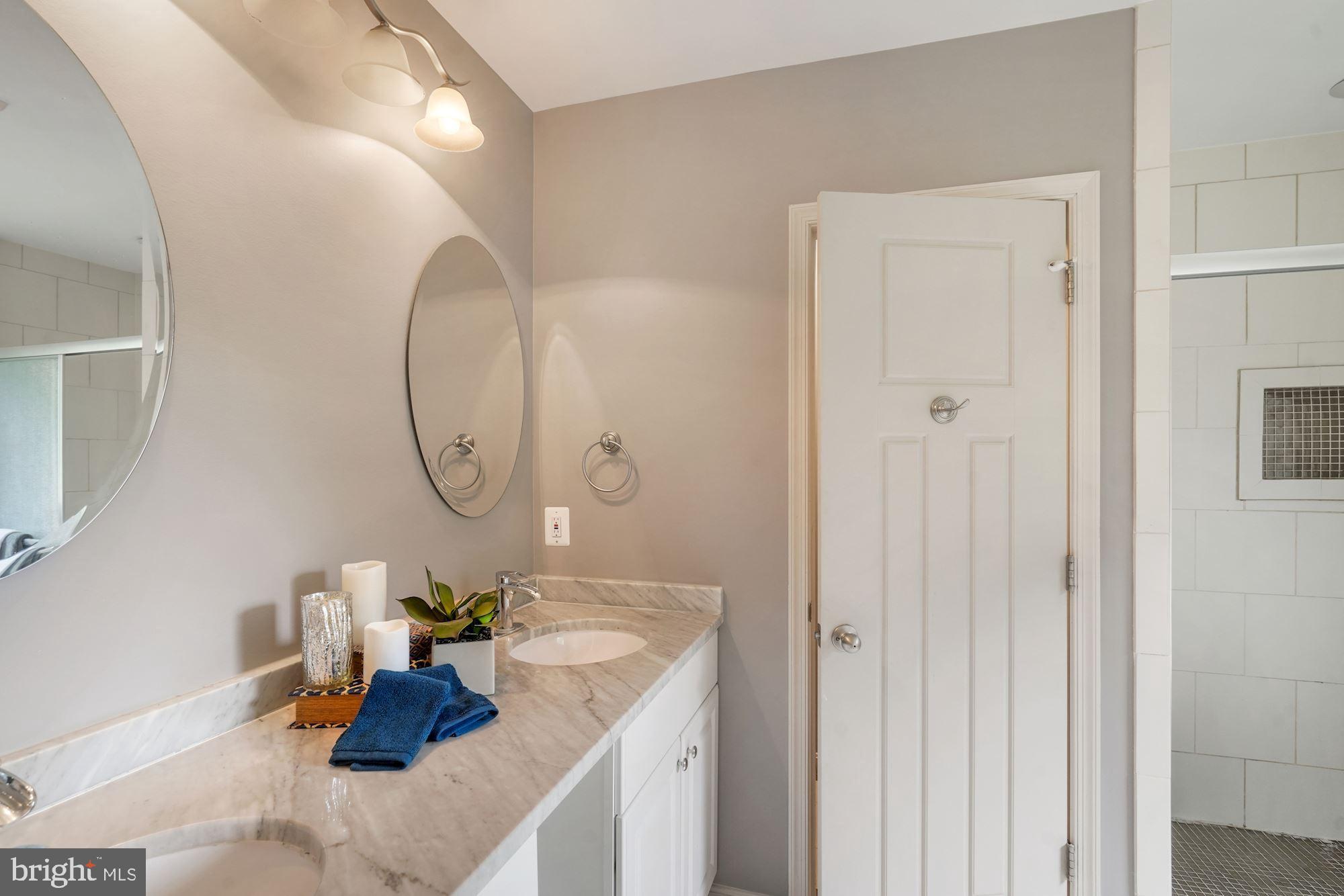 3301 Jermantown Road Fairfax, VA 22030 - Photo 16 of 44 Dual vanities and private toilet
