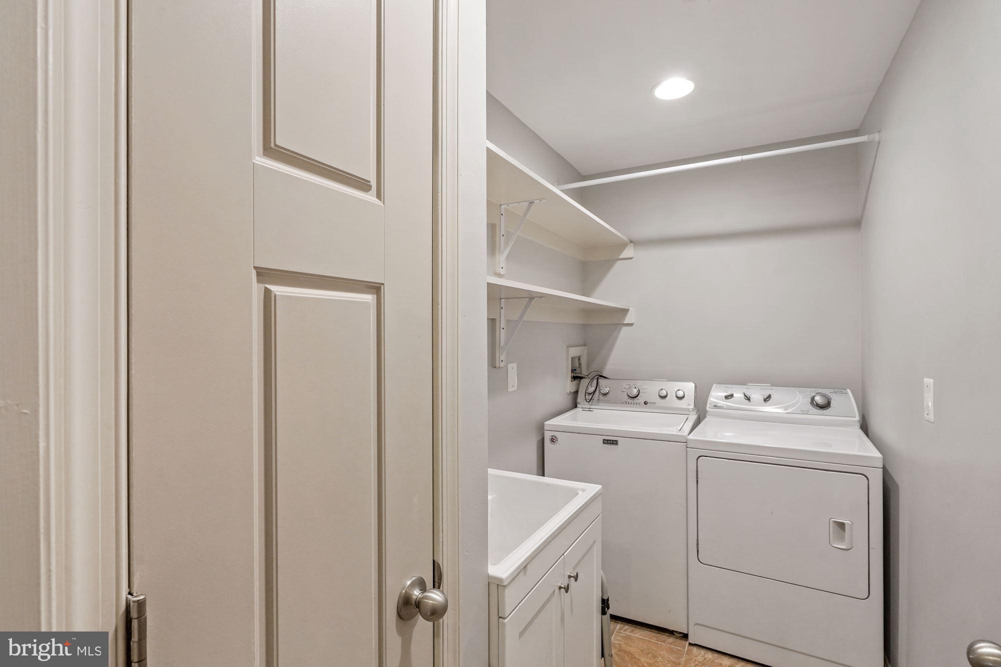 3301 Jermantown Road Fairfax, VA 22030 - Photo 22 of 44 Main floor laundry with linen closet