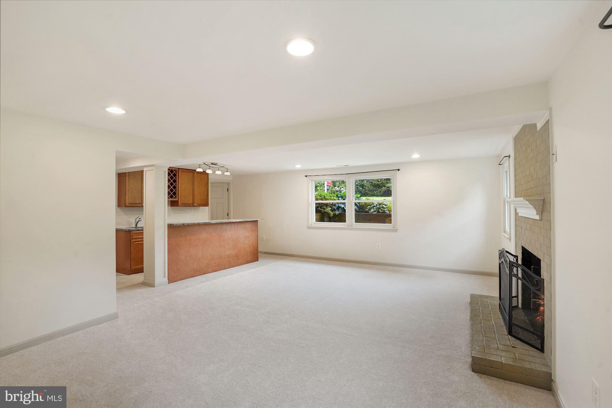3301 Jermantown Road Fairfax, VA 22030 - Photo 23 of 44 Lower level family room with new carpet