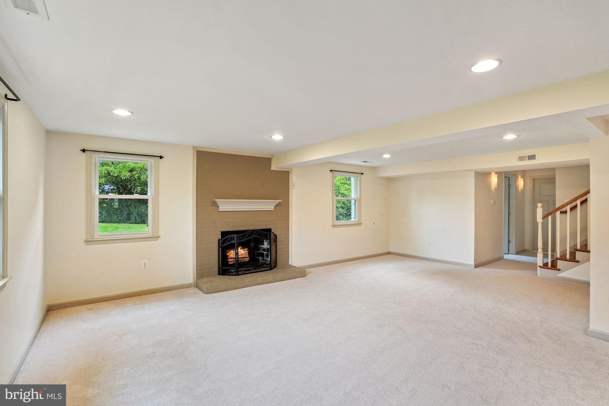 3301 Jermantown Road Fairfax, VA 22030 - Photo 24 of 44 2nd fireplace in lower level family room